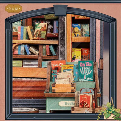 Złożony Book Nook Jakes Bookery na półce z książkami