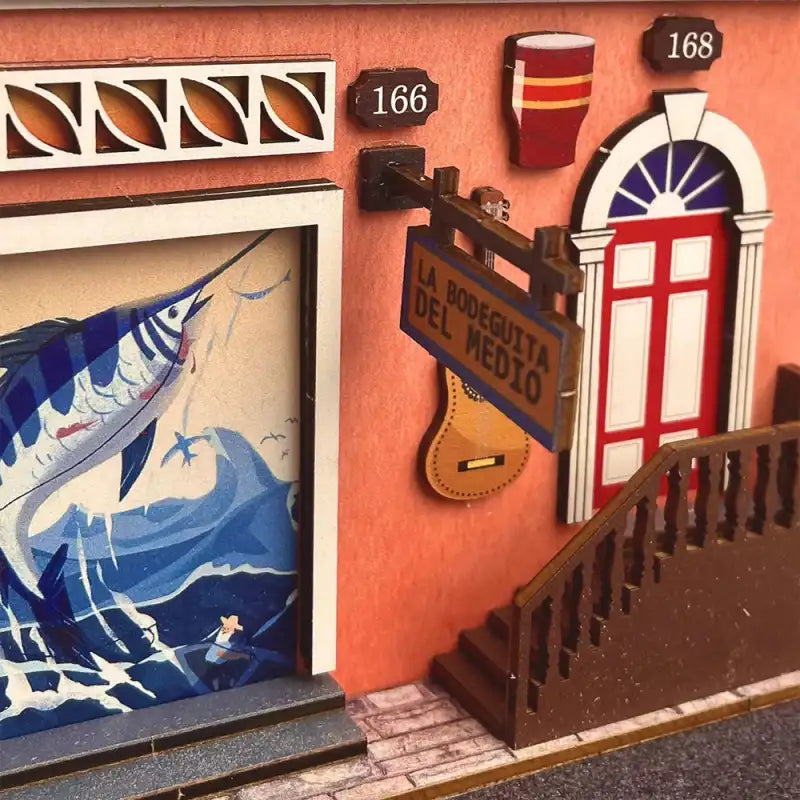 Złożony Book Nook Havana Stroll na półce z książkami