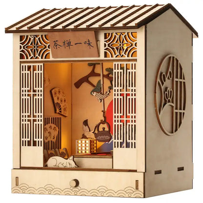 Złożony Book Nook Zen Tea House na półce z książkami