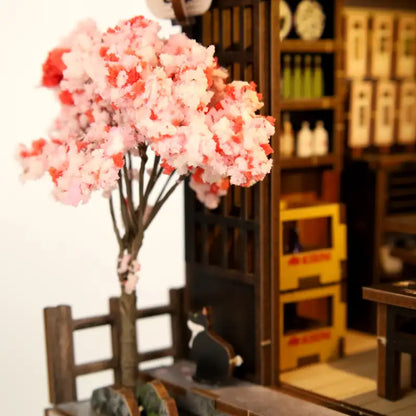 Złożony Book Nook Tokyo Shop na półce z książkami