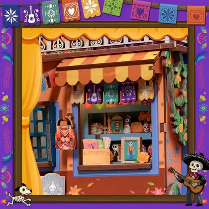 Złożony Book Nook Plaza De Los Muertos na półce z książkami