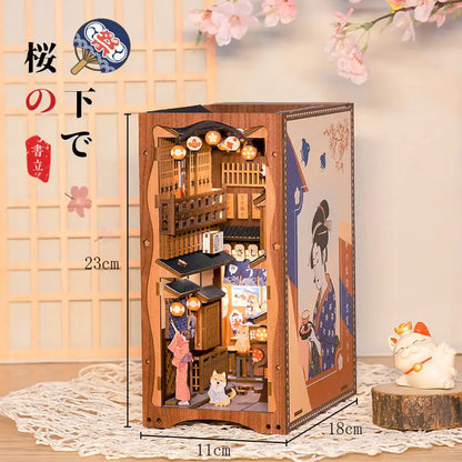 Złożony Book Nook Sakura Tree na półce z książkami